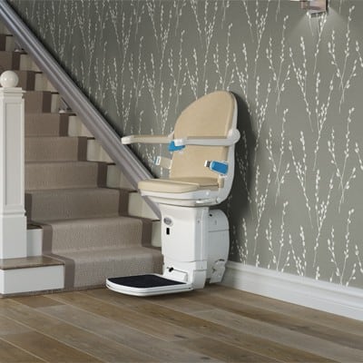 Simplicity Straight stairlift displayed on residential staircase, representing affordable and reliable stair mobility solution with standard features
